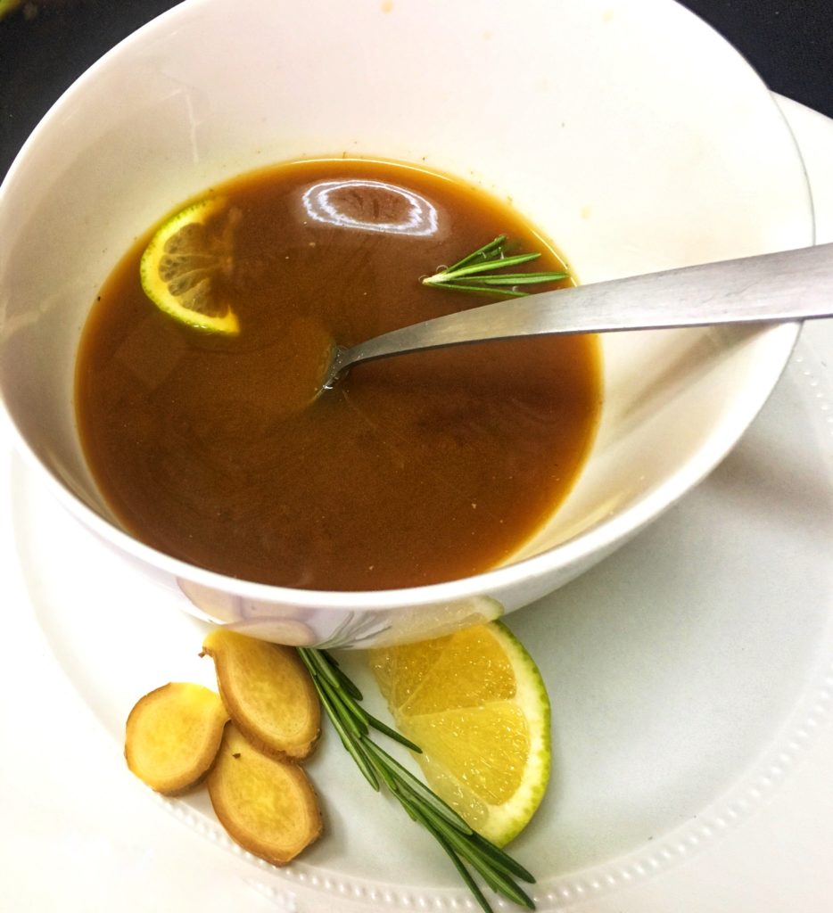 Bone broth infused with ginger, rosemary & lemon
